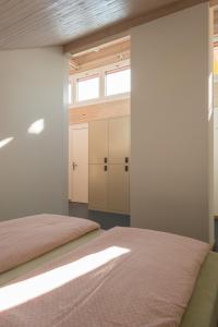 
Ein Bett oder Betten in einem Zimmer der Unterkunft Zug Youth Hostel
