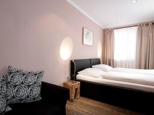 Posteľ alebo postele v izbe v ubytovaní Altstadthotel Kasererbräu