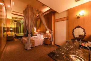 Ліжко або ліжка в номері Hwu Meei Motel