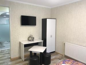 TV a/nebo společenská místnost v ubytování Paradise Hotel