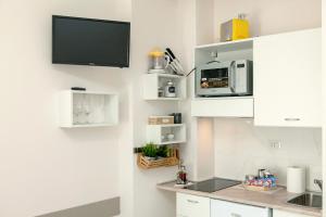 Dapur atau dapur kecil di Appartamento Via Acquati 12 - Monolocale 2