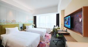 TV o dispositivi per l'intrattenimento presso Hampton By Hilton Foshan Sanshui