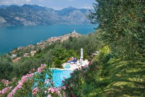 a view of a lake and a town on a hill at Villa Malcesine in Malcesine