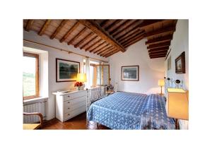 מיטה או מיטות בחדר ב-Agriturismo Molinuzzo