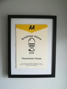 a framed picture of a hamburger in a house at Thurlestone House in St Ives