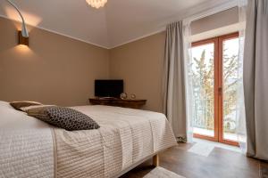 Posteľ alebo postele v izbe v ubytovaní Luxury Villa Hvar Enigma with Pool + 37 fotografií