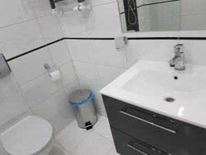 Kúpeľňa v ubytovaní Pokoje Wileńska