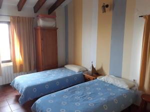 Postel nebo postele na pokoji v ubytování Cabañas Imagina