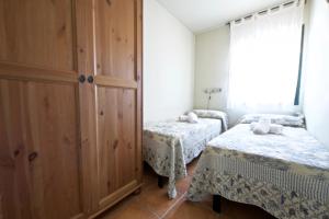 Ένα ή περισσότερα κρεβάτια σε δωμάτιο στο Clavel