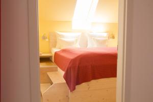 Postel nebo postele na pokoji v ubytování Hotel Gewürzmühle