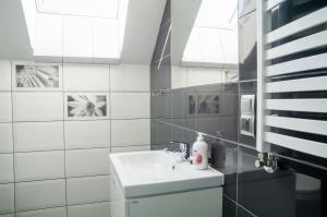 Kúpeľňa v ubytovaní Villa Mikołajki Popiełuszki 8 + 37 fotografií