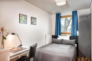 Postel nebo postele na pokoji v ubytování Hotel Ambassador-Berlin Grünau