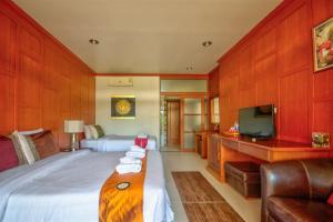 TV a/nebo společenská místnost v ubytování Palm Beach Resort