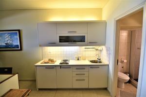 A kitchen or kitchenette at Blue Bay View - Beach House