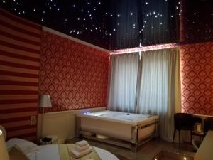 Postel nebo postele na pokoji v ubytování Hotel Terre Dei Salici