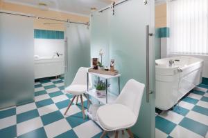 Koupelna v ubytování Hotel Excelsior