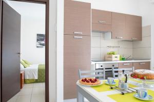 A kitchen or kitchenette at Green Residence
