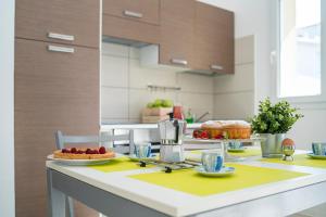 A kitchen or kitchenette at Green Residence