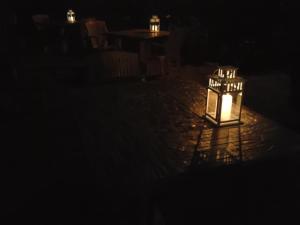 a lantern lit up in the dark at night at La Casa di Ulisse B&B in Quercianella