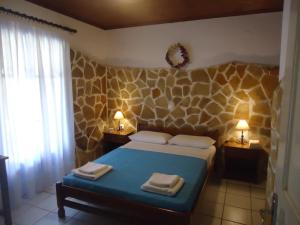 Posteľ alebo postele v izbe v ubytovaní Valentino Villas & Apartments