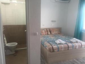 Postel nebo postele na pokoji v ubytování Apartmani Alex Beach