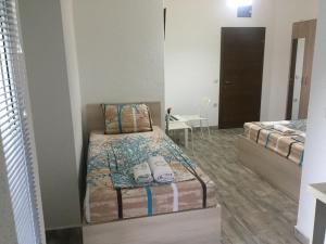 Postel nebo postele na pokoji v ubytování Apartmani Alex Beach