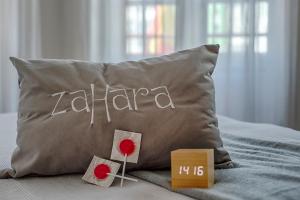 Posteľ alebo postele v izbe v ubytovaní Hostal Zahara