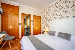 Posteľ alebo postele v izbe v ubytovaní Hostal Zahara