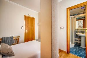 Posteľ alebo postele v izbe v ubytovaní Hostal Zahara