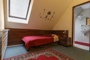 Кровать или кровати в номере Penzión Grand