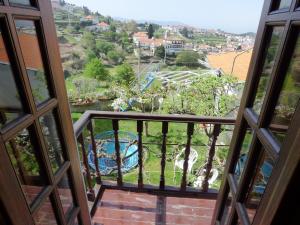 a view from a window of a playground at Casa Na Montanha Da Neve in Seia