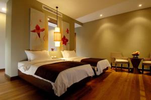 Postel nebo postele na pokoji v ubytování Chongfah Resort Khao Lak - SHA Extra Plus