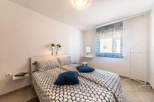 Postel nebo postele na pokoji v ubytování Apartment Vivis