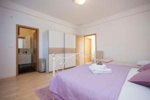 Postel nebo postele na pokoji v ubytování Rooms Katarina