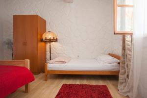 Postel nebo postele na pokoji v ubytování Rooms Katarina
