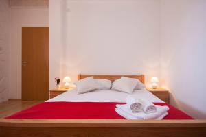 Postel nebo postele na pokoji v ubytování Rooms Katarina