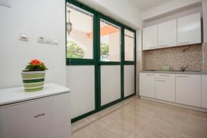 Kuchyň nebo kuchyňský kout v ubytování Rooms Katarina