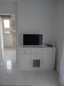Μια τηλεόραση ή/και κέντρο ψυχαγωγίας στο Apartamento en Vinaros