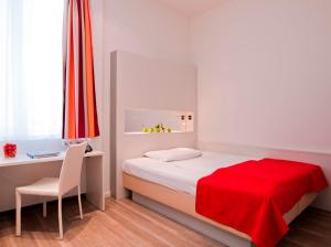 Voodi või voodid majutusasutuse Hotel Zipser toas