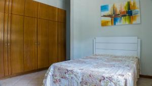 Säng eller sängar i ett rum på Pousada Il Conventino