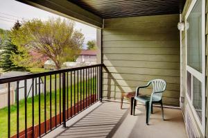 a chair on the porch of a house at Lakeview Inns & Suites - Edson Airport West in Edson