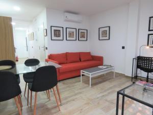 Posezení v ubytování Living Sevilla Apartments Hércules
