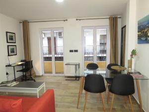 Posezení v ubytování Living Sevilla Apartments Hércules