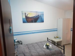 Postel nebo postele na pokoji v ubytování I Villini Affittacamere