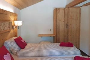 Postel nebo postele na pokoji v ubytování Guggerzyt