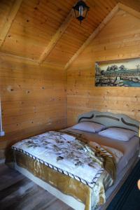 Ένα ή περισσότερα κρεβάτια σε δωμάτιο στο Motel Krstac