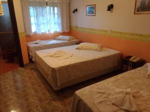 Postel nebo postele na pokoji v ubytování Pousada Vollweiter