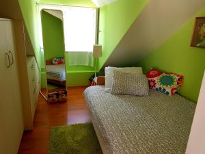 Postel nebo postele na pokoji v ubytování Apartment Silvia
