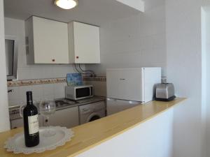 Kuchyňa alebo kuchynka v ubytovaní Best View - Welcome Penthouse Apartamentos Karola