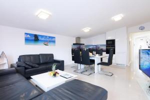 TV a/nebo společenská místnost v ubytování Studio Apartment Maslina